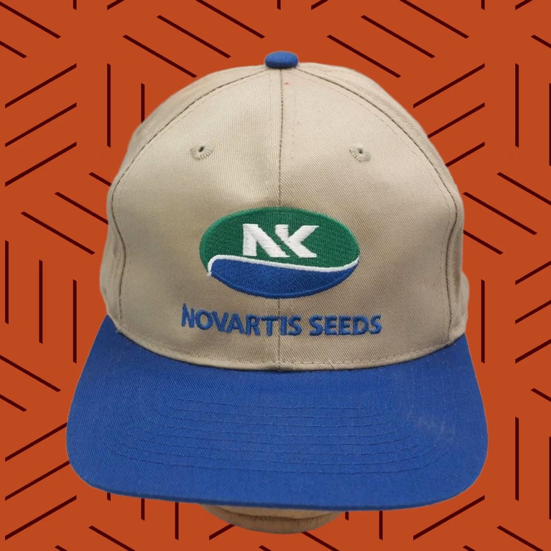 Vintage VINTAGE Snapback Trucker Hat Novartis Seeds 1980s Size ONE SIZE - 1 Thumbnail