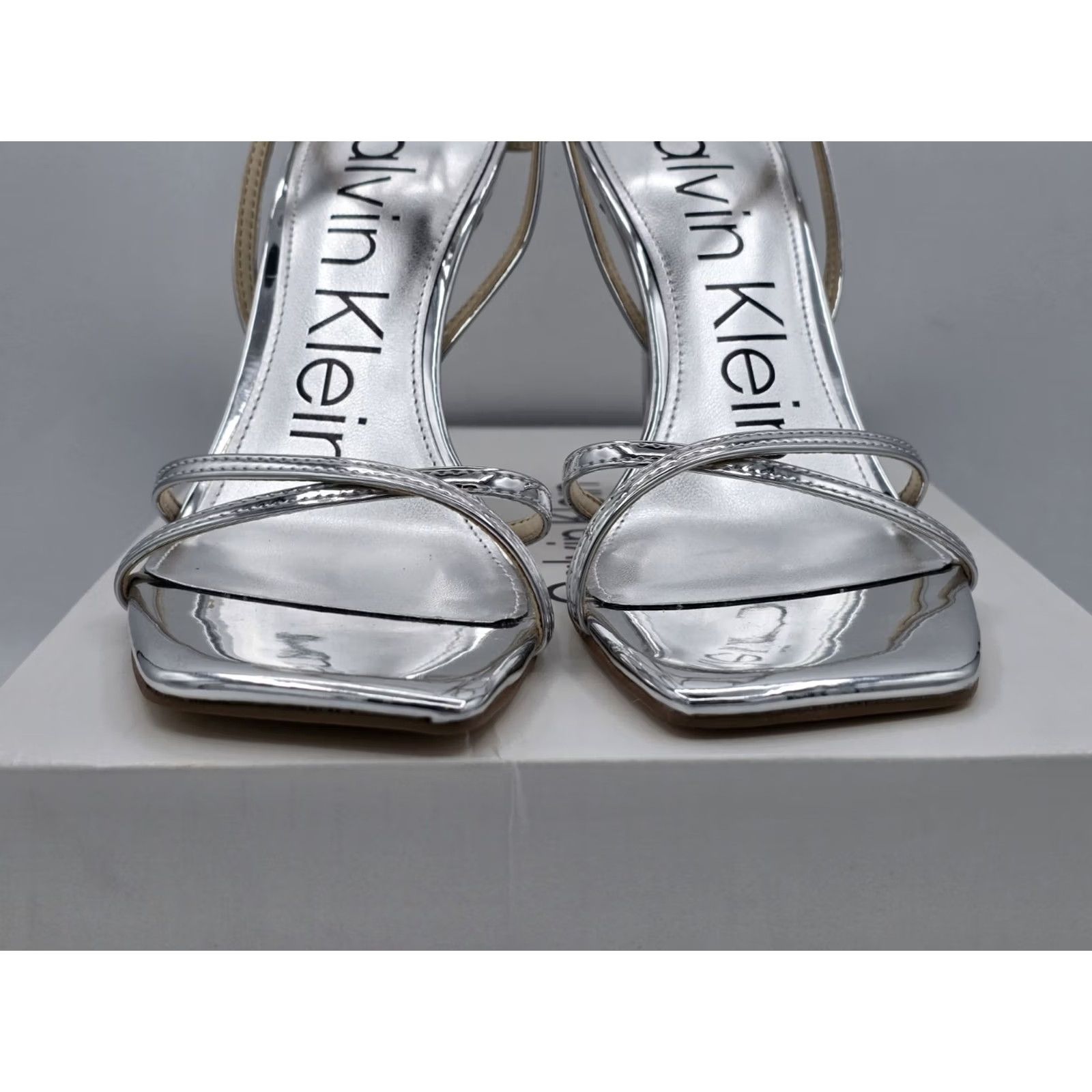 Calvin Klein Keywords: "Calvin Klein" is included, and important like "heel sandal" "silver" are incorporated Size US 8 / IT 38 - 3 Thumbnail