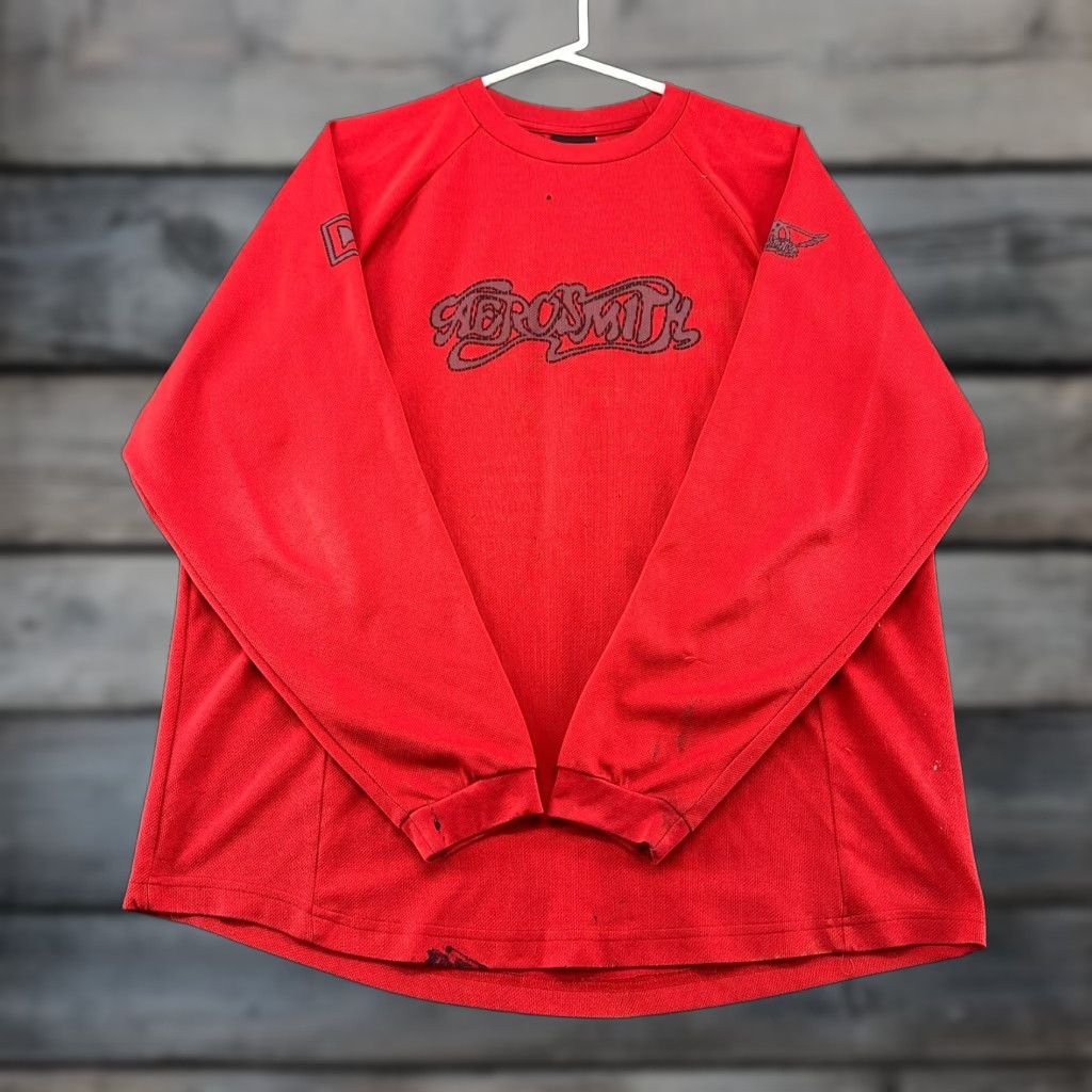 Aerosmith **VINTAGE Aerosmith Red Men Long Sleeve Spellout Jersey 90s** User: VINTAGE Aerosmith Red Men Long Sleeve Spellout Jersey 90s Size US L / EU 52-54 / 3 - 1 Thumbnail