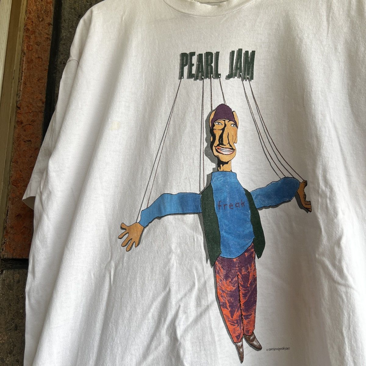 image of Band Tees x Brockum 1993 Pearl Jam Vs. Marionette Freak Band Tour Tee Shirt in White (Size XL)