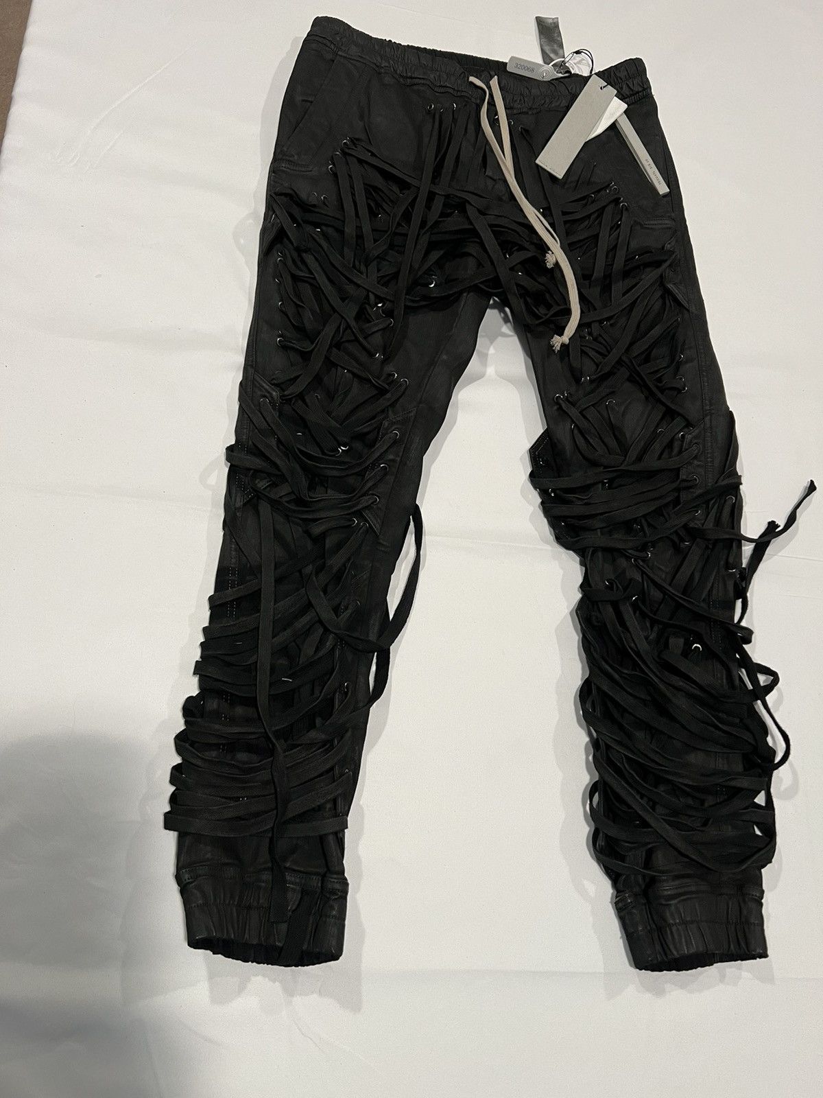 Rick Owens Thomas mega laced waxed jogger pants. 54/36