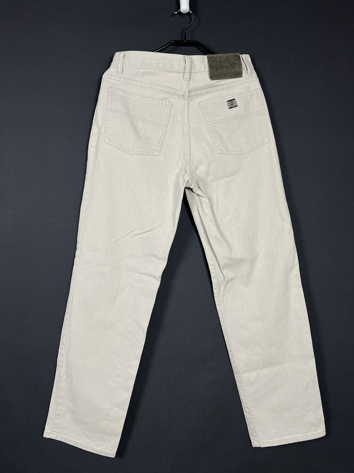 Vintage Yves Saint Laurent YSL luxury metal logo jeans