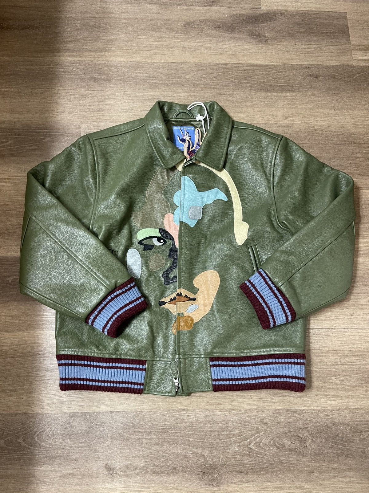 KidSuper PATCHWORK FACE LEATHER VARSITY JACKET [GREEN] Size US L / EU 52-54 / 3 - 1 Thumbnail