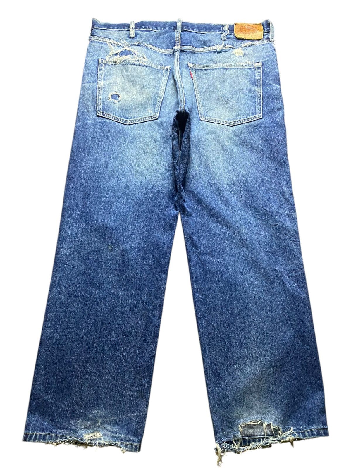 Vintage Levis 502 Blue Wash Ripped Straight Jeans