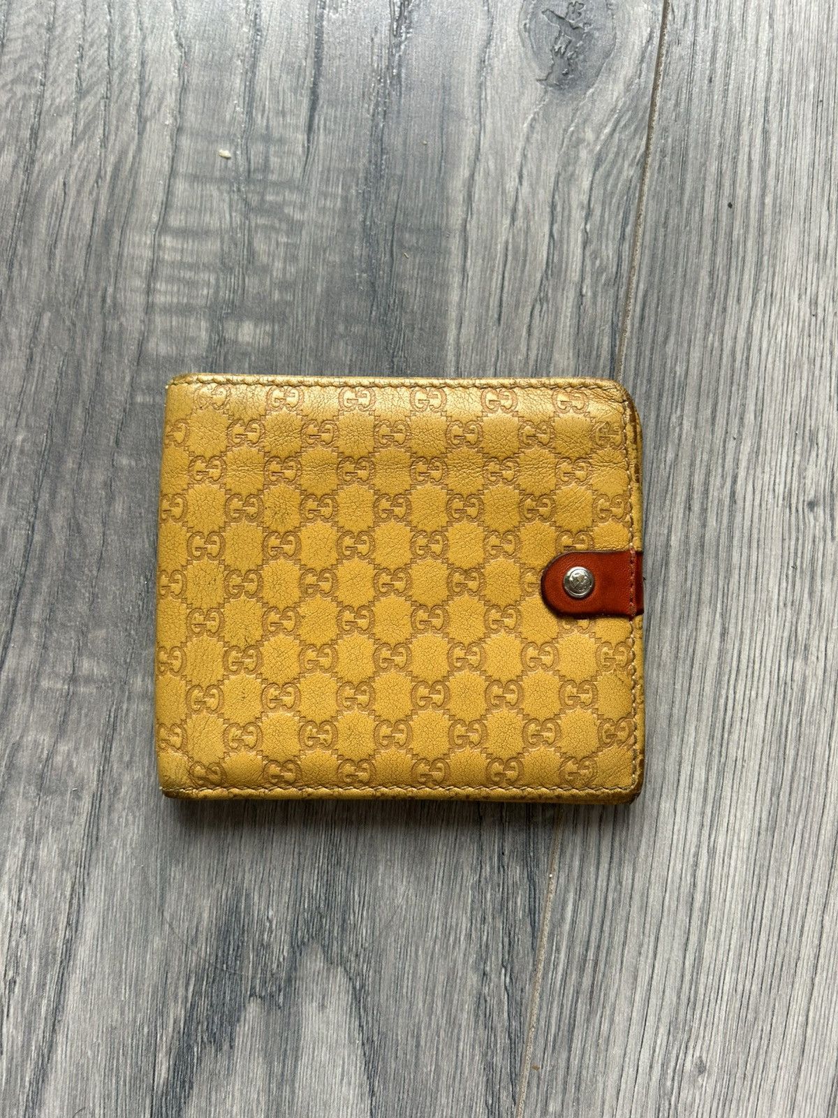 Gucci Bi-Fold Wallet in Yellow Monogram Leather