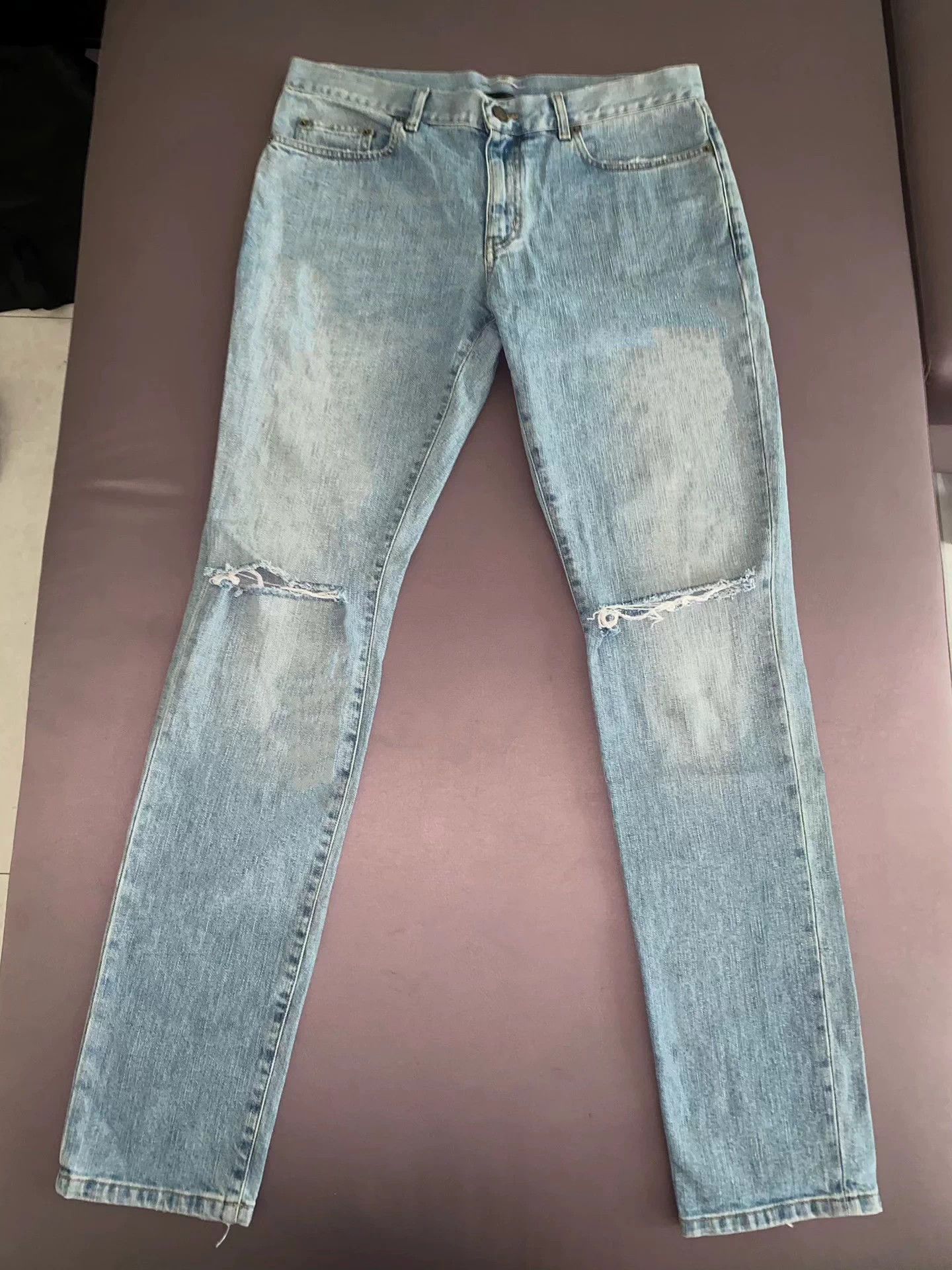 Saint Laurent slp16SS runway-style distressed jeans