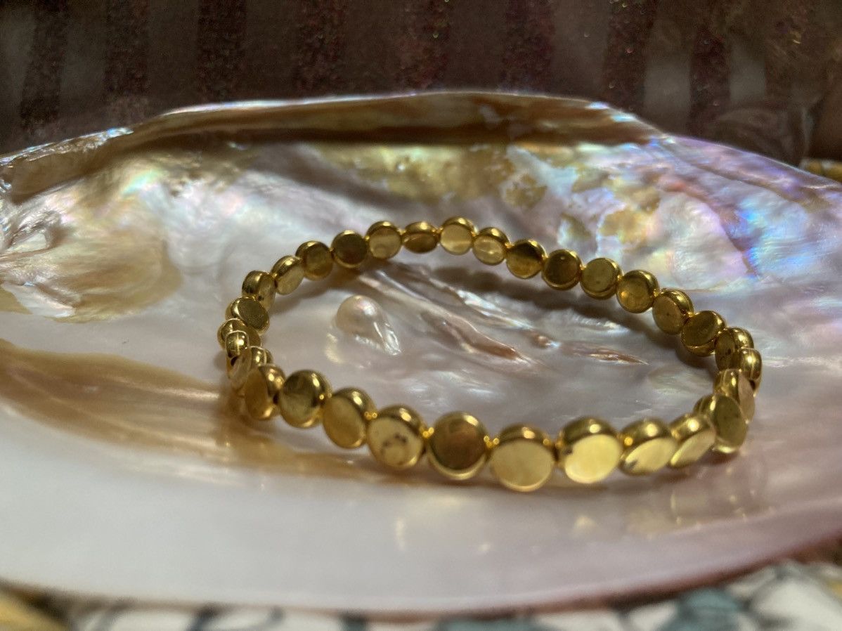 Other Yellow gold coloured flat circular beaded bracelet Size ONE SIZE - 1 Thumbnail