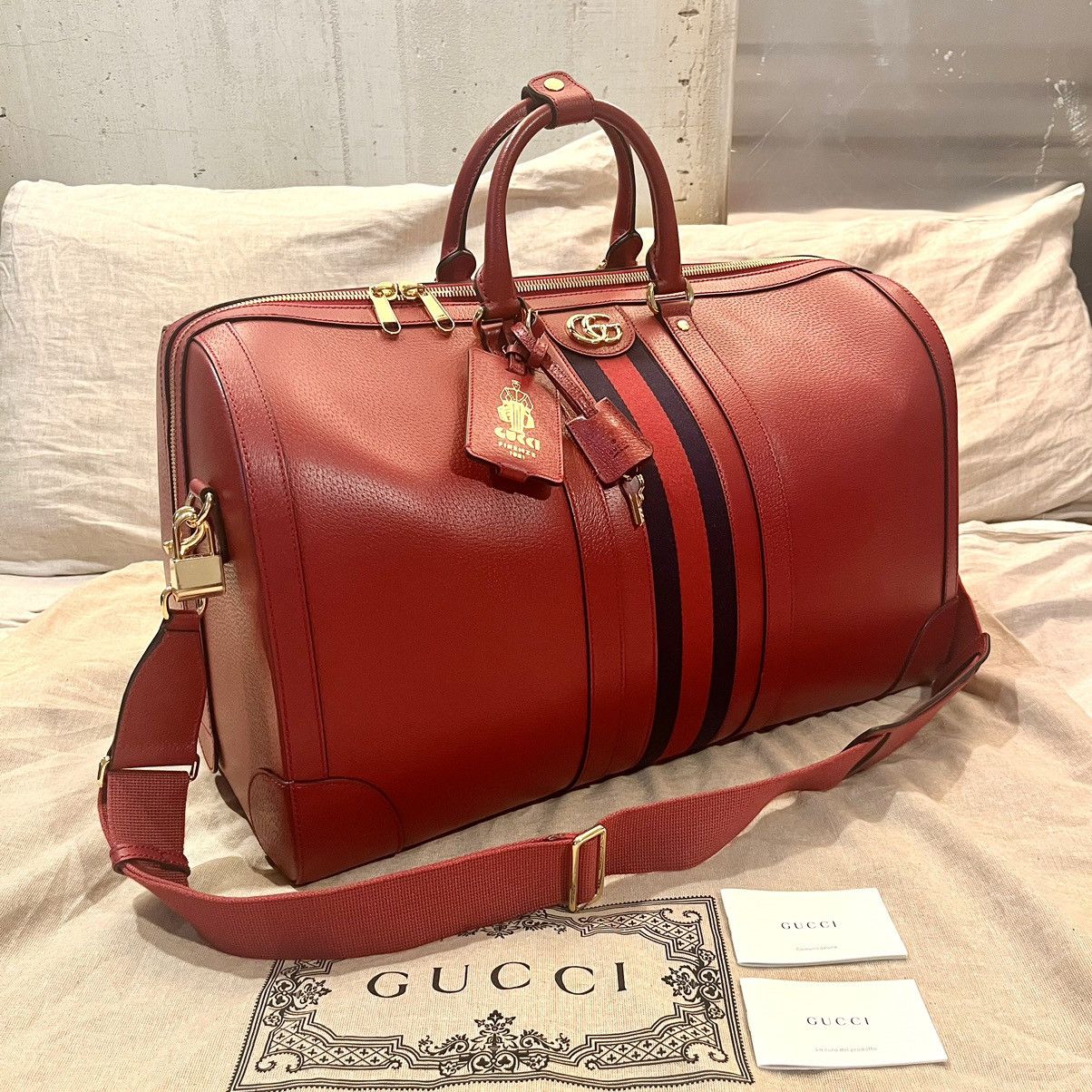 image of Red Large Savoy Leather Duffle Bag, GG Gucci Monogram, Men's