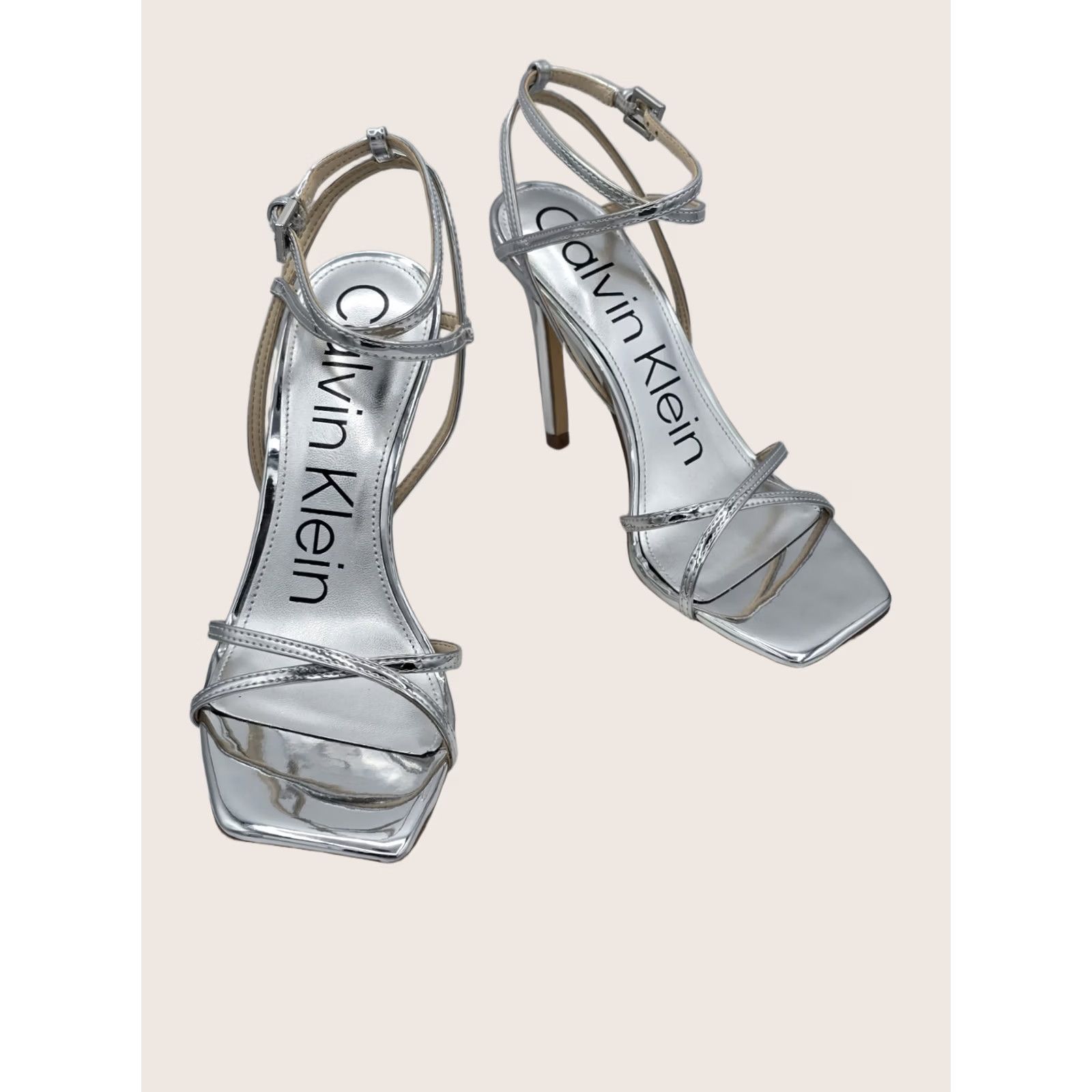 Calvin Klein Keywords: "Calvin Klein" is included, and important like "heel sandal" "silver" are incorporated Size US 8 / IT 38 - 1 Thumbnail
