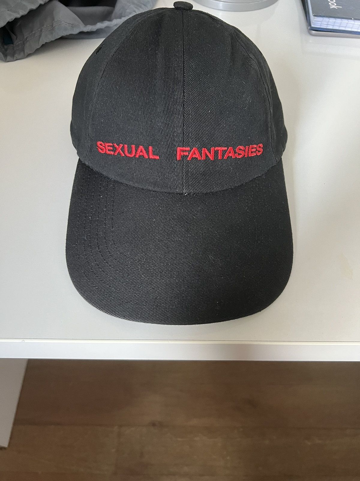 image of Vetements Sexual Fantasies Hat in Black, Men's