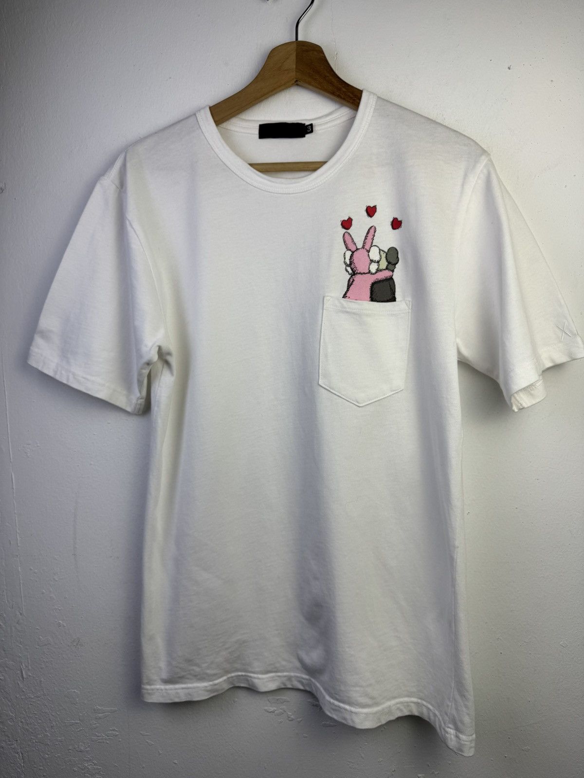 Original Fake KAWS + Original Fake Pink Accomplice shirt. Size US M / EU 48-50 / 2 - 3 Thumbnail