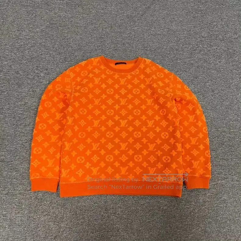 louis vuitton orange printed sweatshirt size M.