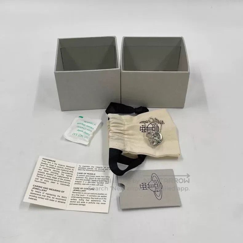 Vivienne Westwood Vivienne Westwood Bow-tie transparent orb, pure silver, br Size ONE SIZE - 2 Thumbnail