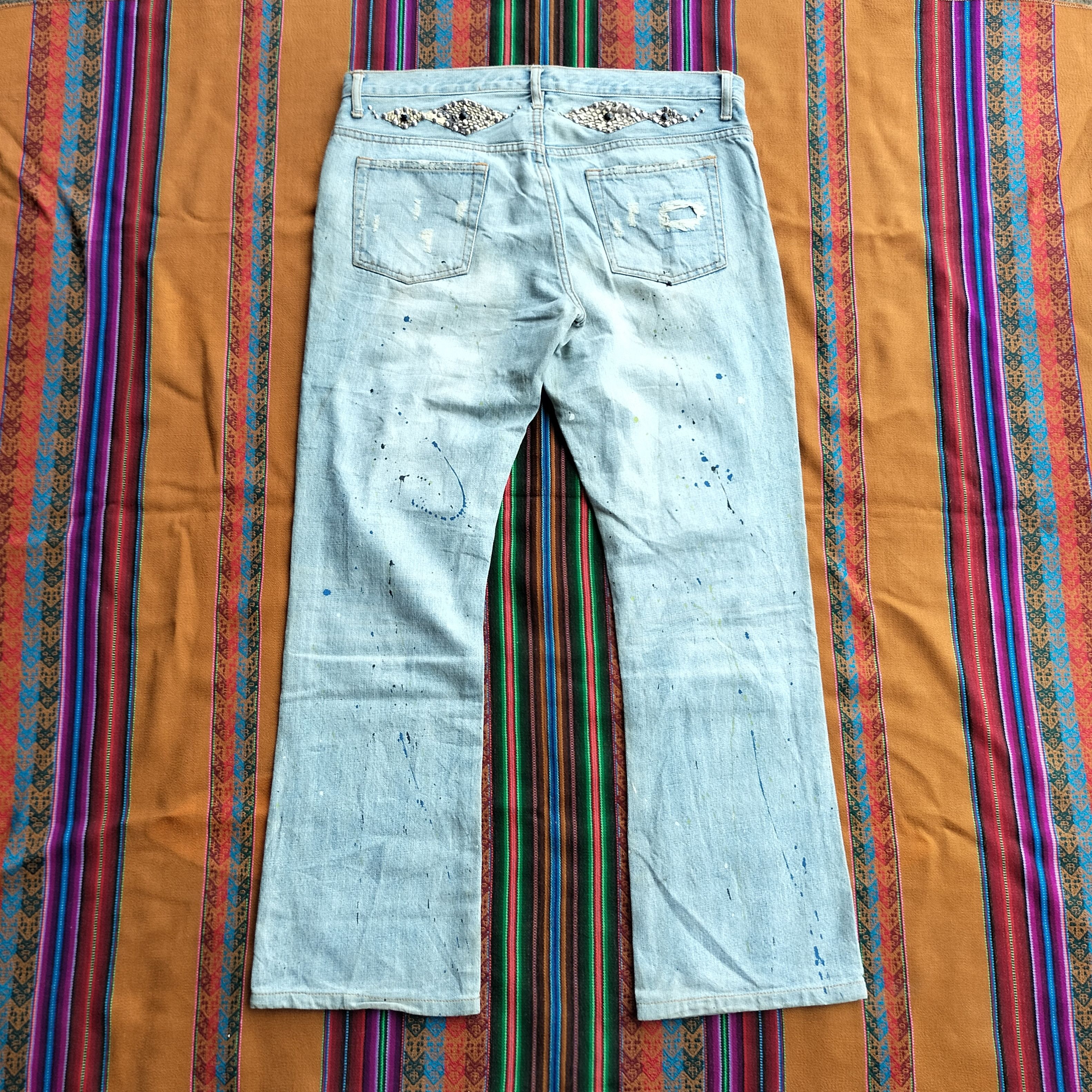 Tornado Mart paint splash snake skin studdet distressed flare denim Size US 35 - 2 Thumbnail