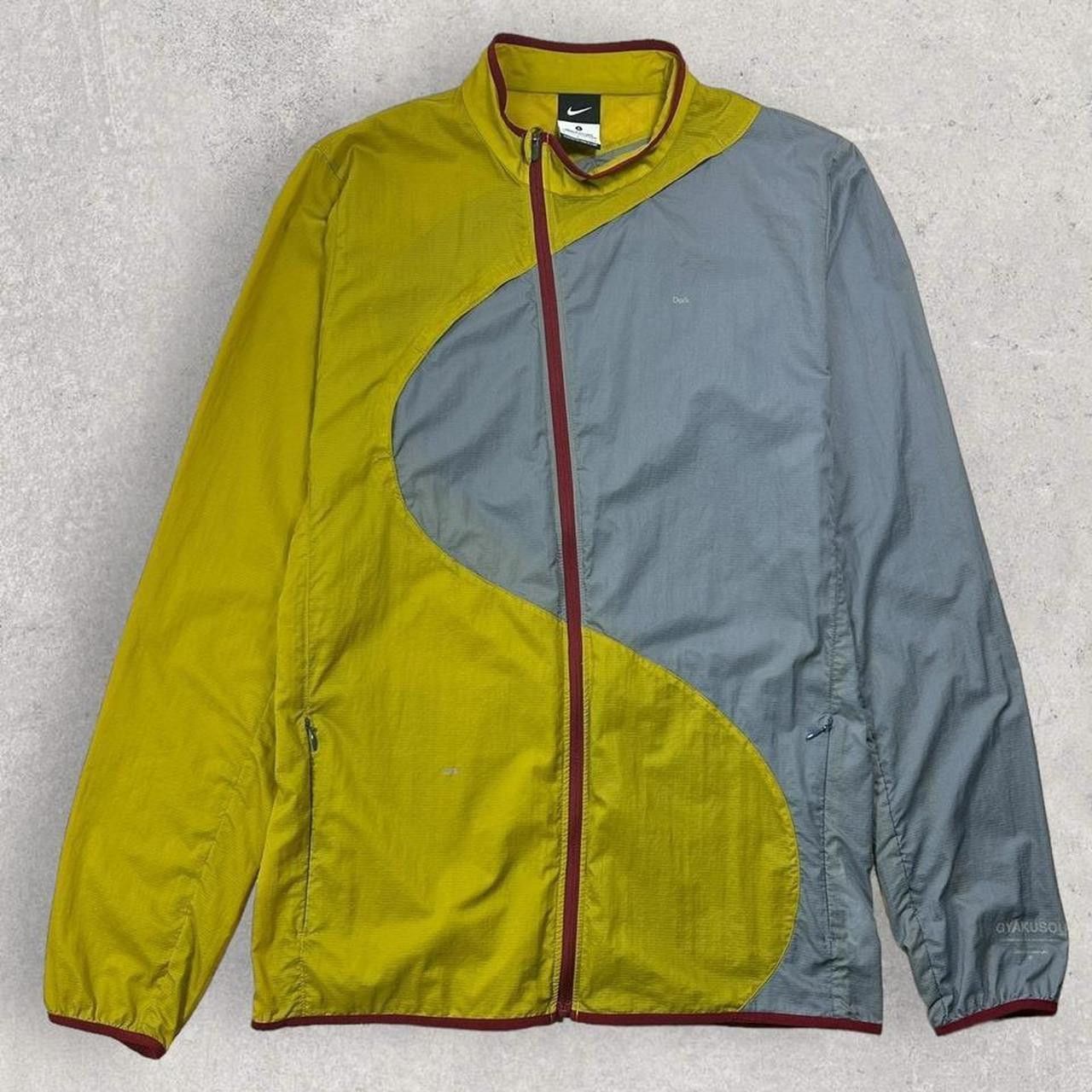 image of Nike Undercover X Gyakusou Asymmetric Zip Jacket in Yellow, Men's (Size Small)