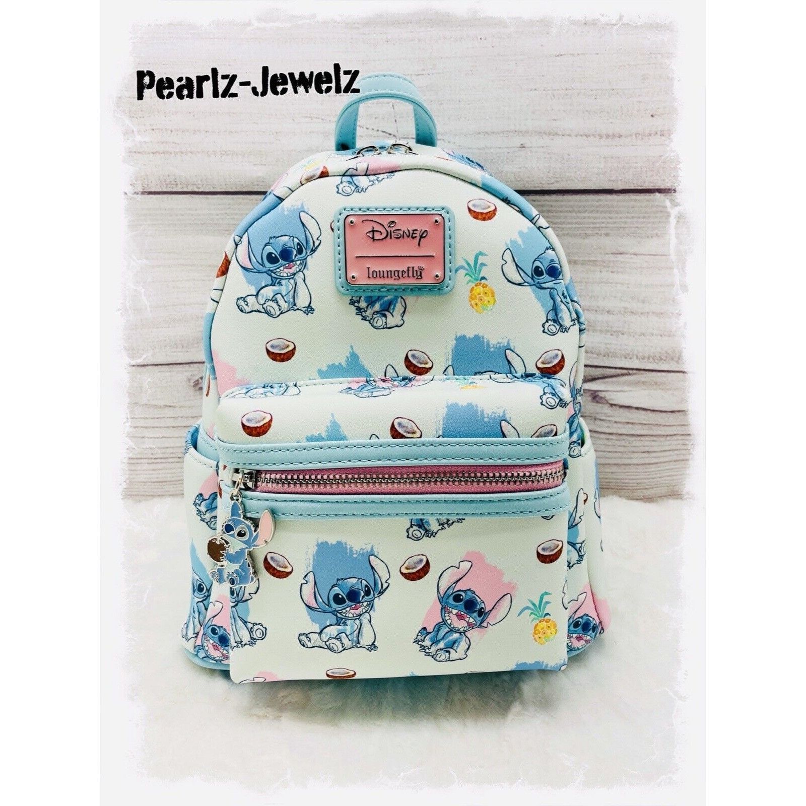 image of Loungefly Disney Lilo & Stitch Coconut Allover Print Mini Ba in Blue, Women's