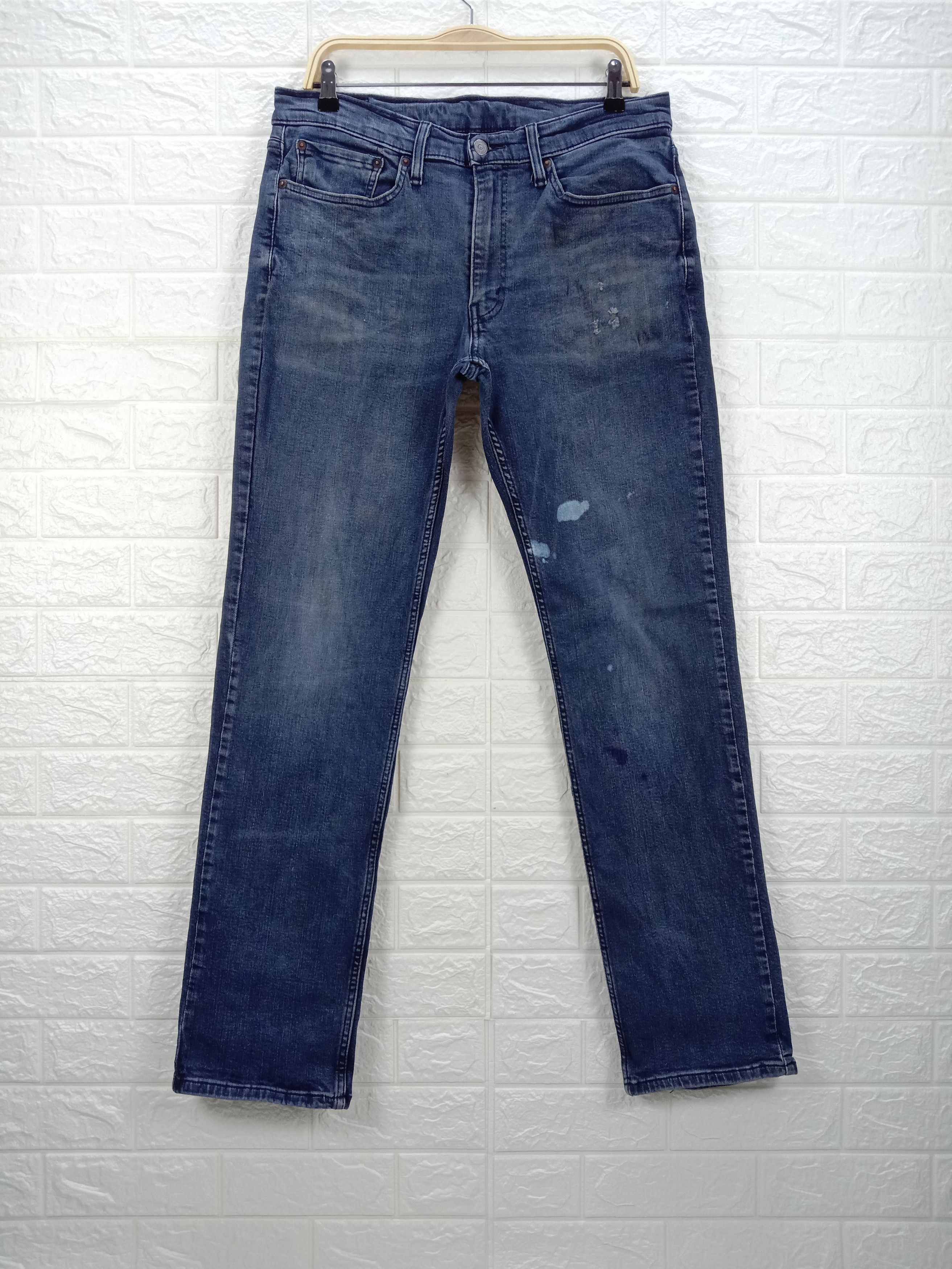 image of Vintage Levi's 514 Jeans Slim Straight Distressed Denim in Blue, Men's (Size 34)