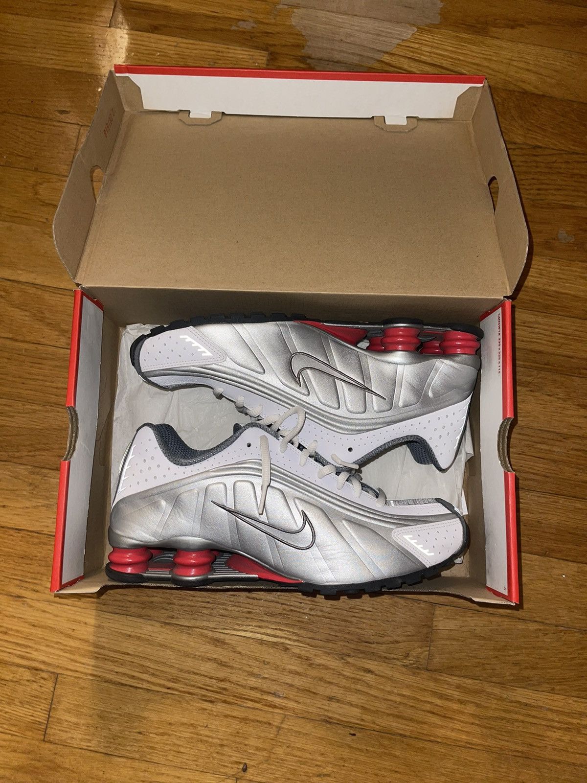 image of Nike Shox White Metallic Shoes, Men's (Size 9.5)