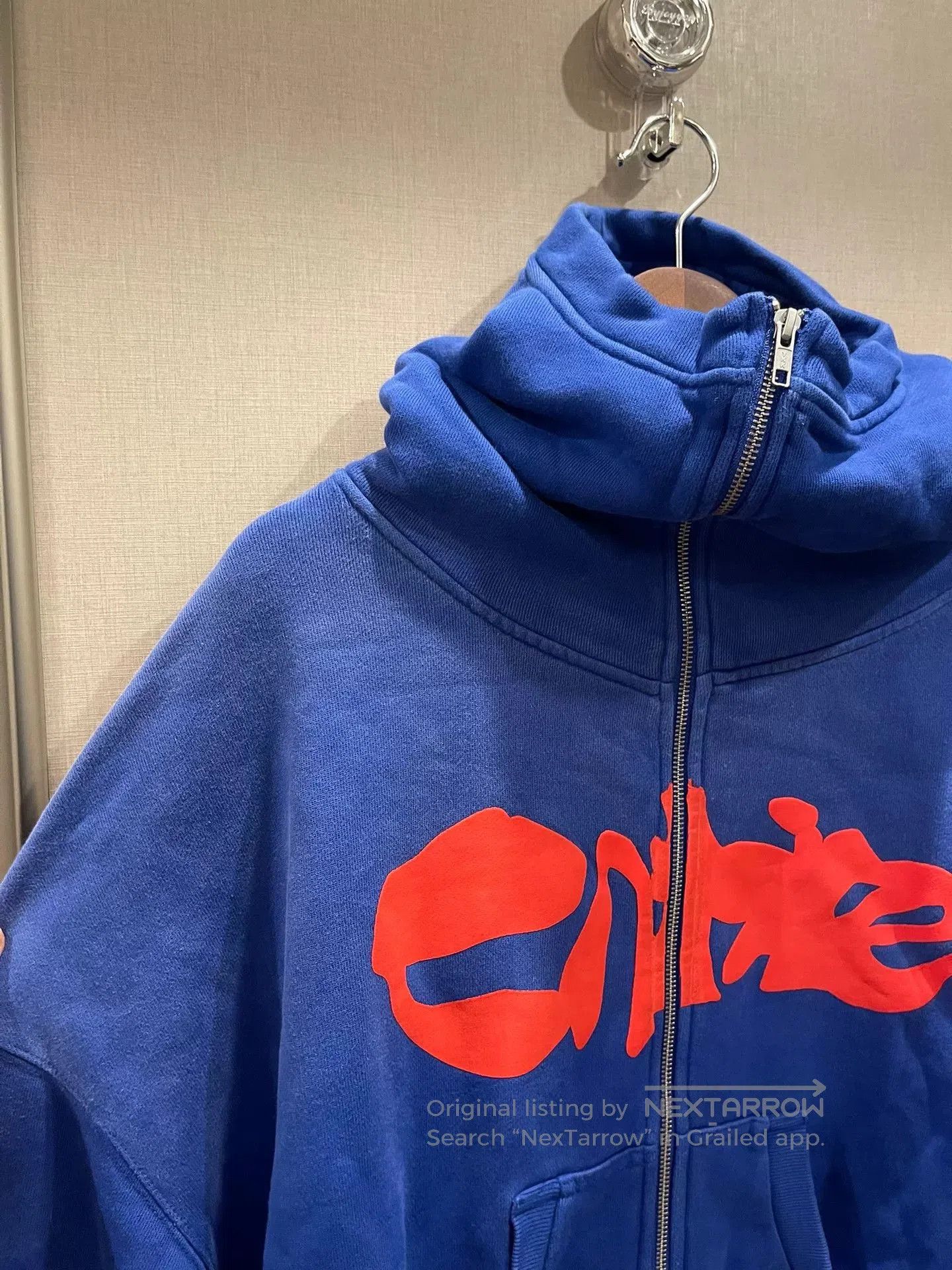 oversized blue zip.