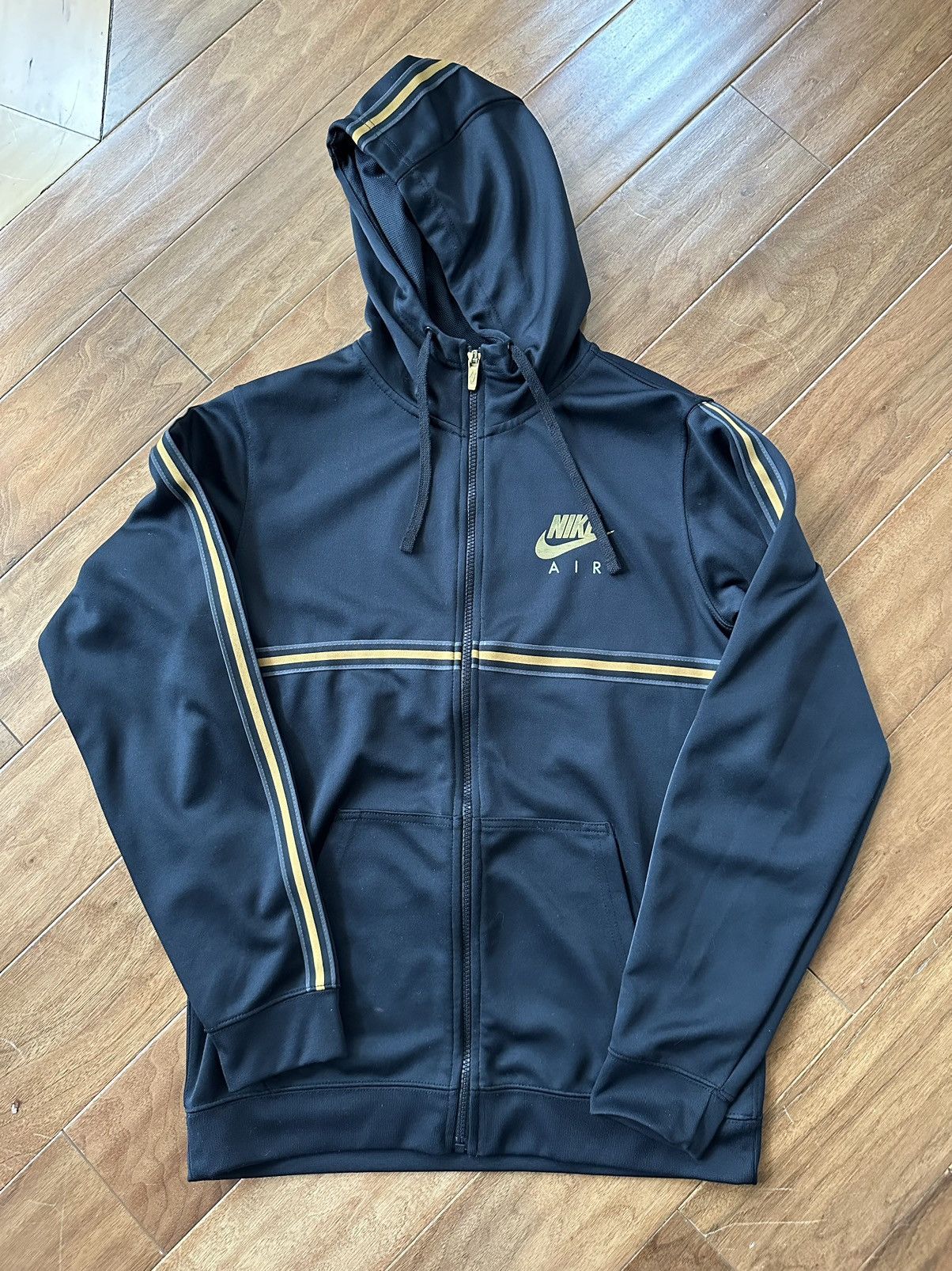 Nike Black and gold nike zip up | Grailed