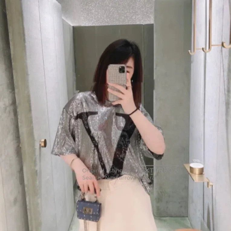 Valentino Silver sequins embellish the top