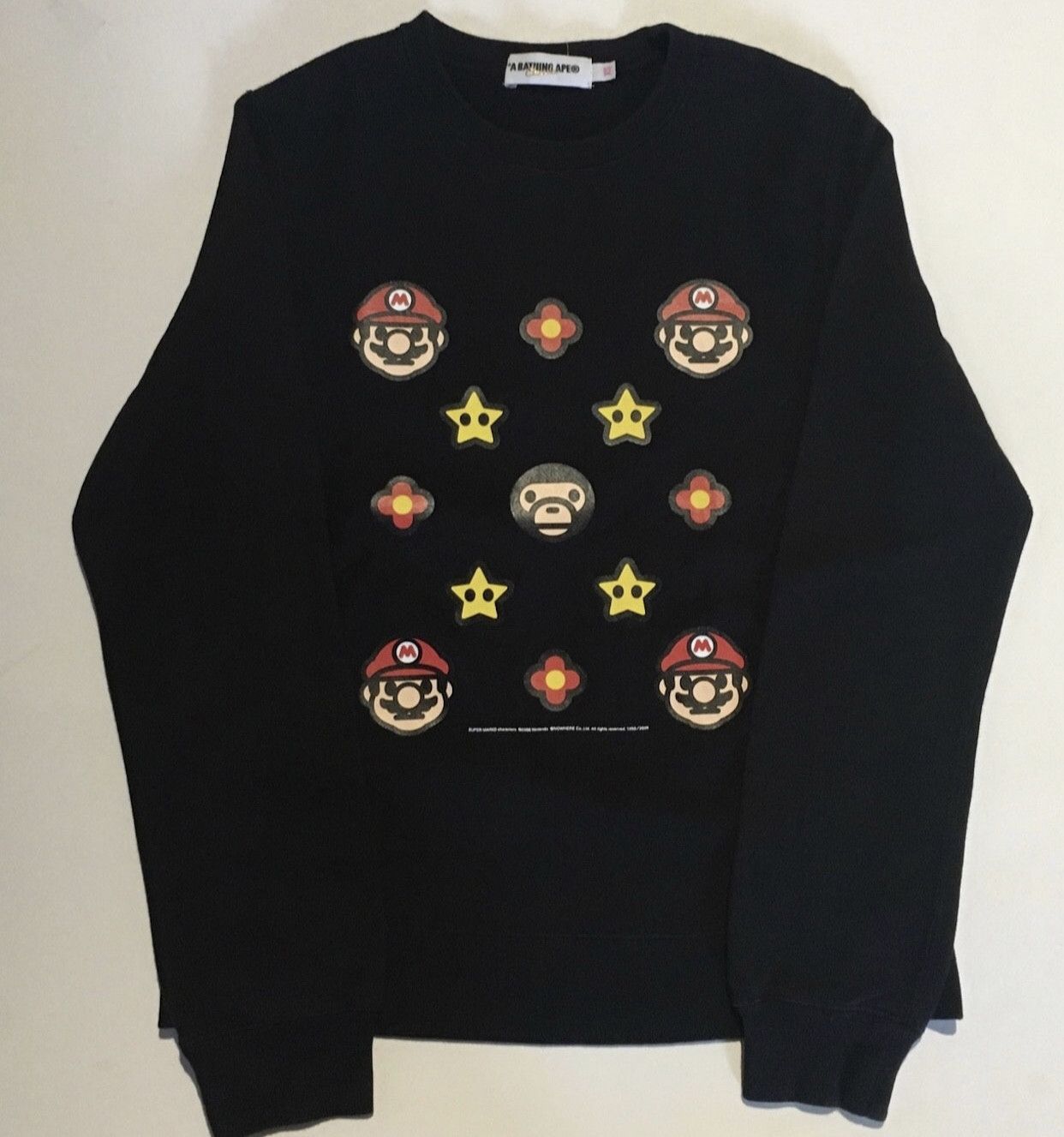 image of Bape Baby Milo Mario Crew Neck Sweatshirt in Black, Women's (Size XS)