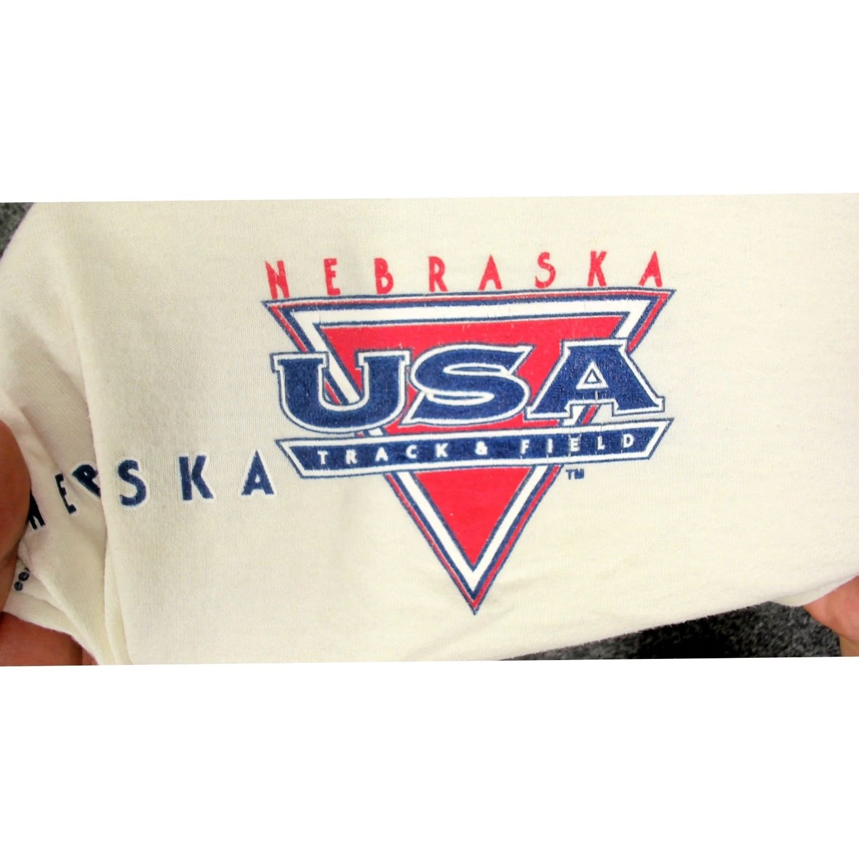 Fruit Of The Loom VINTAGE 1997 Junior Olympics Nebraska Track T Shirt Mens L Single Stitch Crew Neck Short Sleeve Cotton Cream 90s Retro Running Shirt Boxy Fit Mens Size US L / EU 52-54 / 3 - 7 Thumbnail