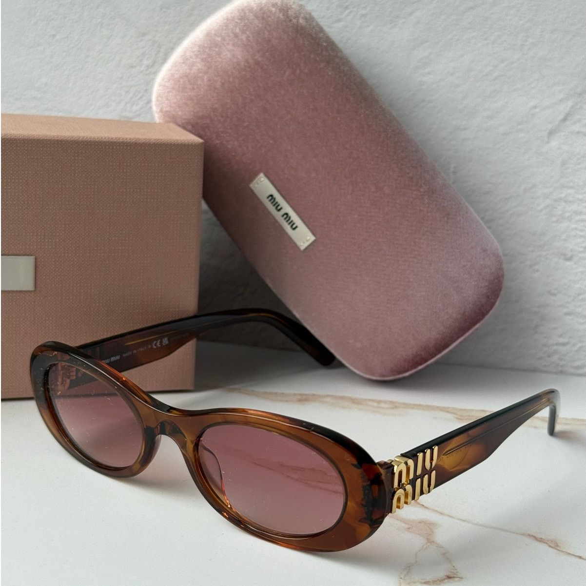 Miu Miu NEW Miu Miu MU06ZS Brown Oval Sunglasses Size ONE SIZE - 1 Thumbnail