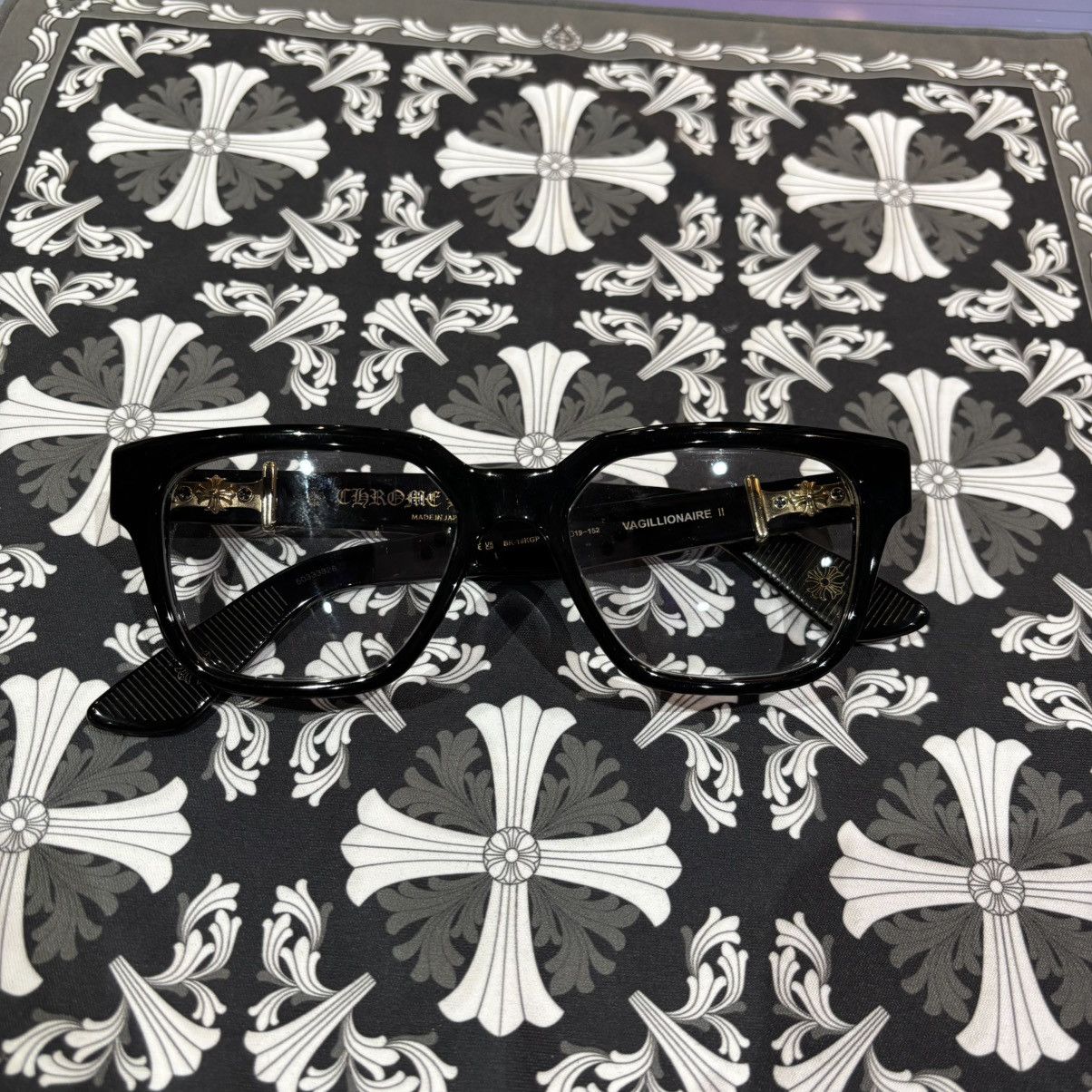 Vagillionaire II Black & Gold Sunglasses with case.