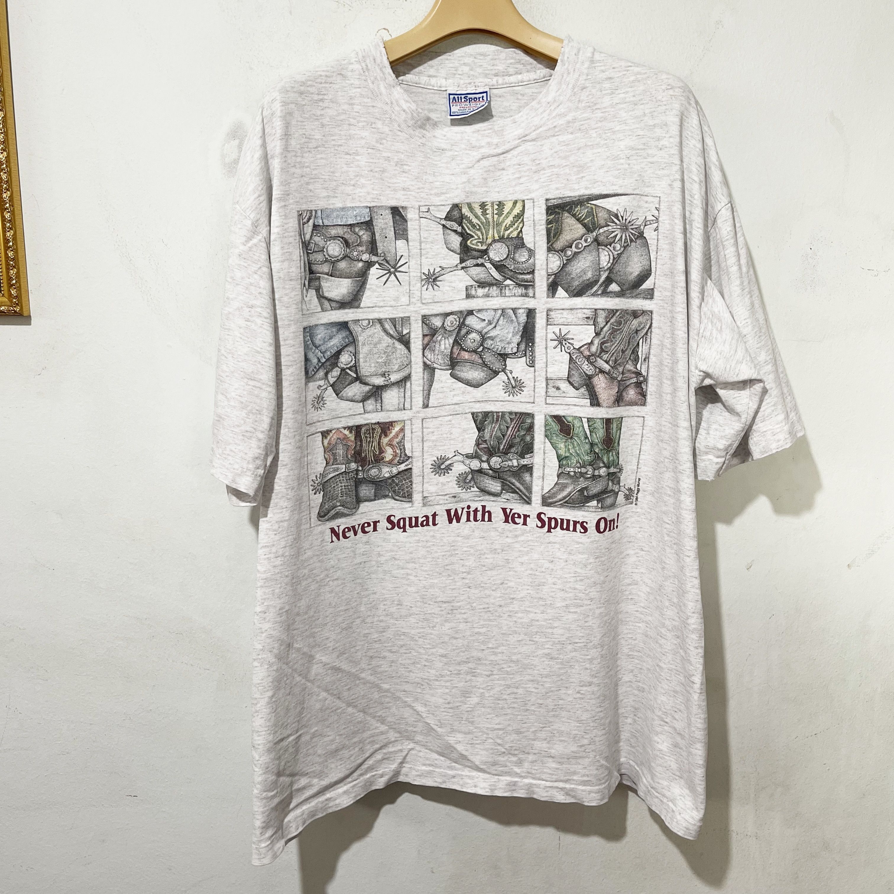 Vintage Vintage 1994 Peggy Murray Never Squat With Yer Spurs T-Shirt Size US XL / EU 56 / 4 - 1 Thumbnail