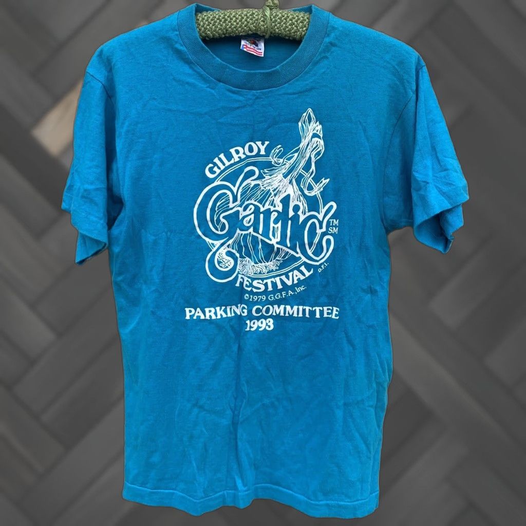 Fruit Of The Loom VINTAGE Gilroy Garlic Festival GGFA Inc Parking Committee 1993 t shirt M blue cotton Men Turquoise Graphics Tee Sportswear/Beach 1990s Shirt Size US M / EU 48-50 / 2 - 1 Thumbnail