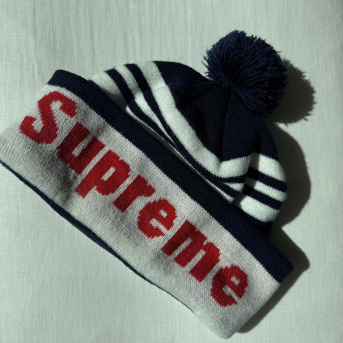 Supreme SUPREME NAVY STRIPE ACRYLIC POM BEANIE W RED LOGO Size ONE SIZE - 3 Thumbnail