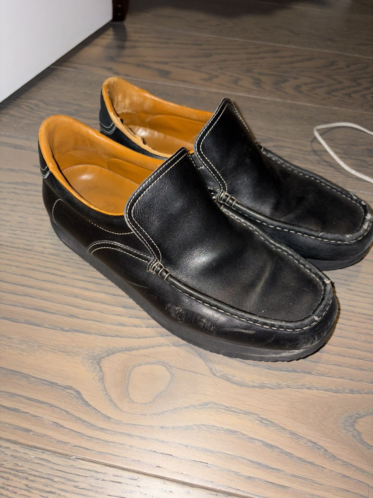 Black Hermes leather loafers with grip soles