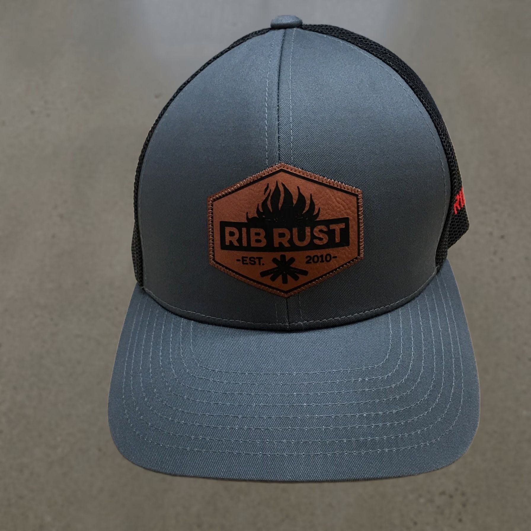 Logo 7 Rib Rust Trucker Hat Unisex Black Gray One Size Curved Brim Embroidered Logo Size ONE SIZE - 1 Thumbnail