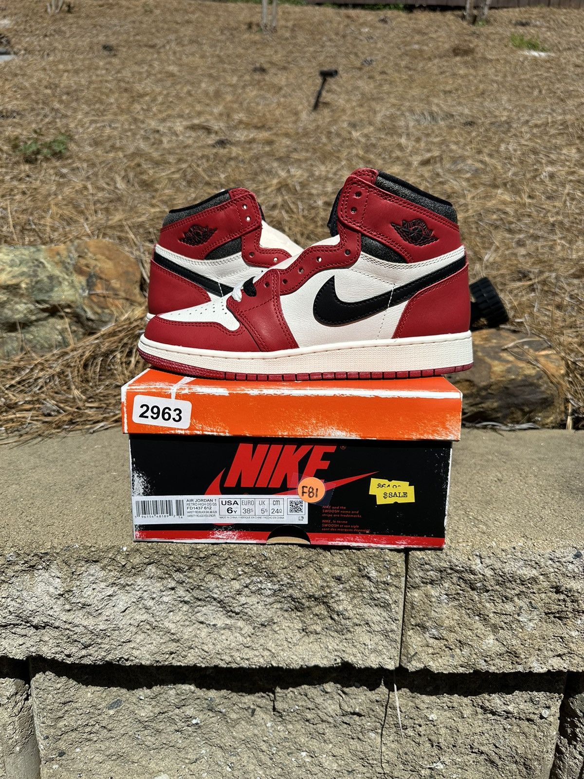 image of Jordan Nike Jordan 1 Retro High OG Chicago Reimagined Lost & Found Shoes in Red, Men's (Size 6)