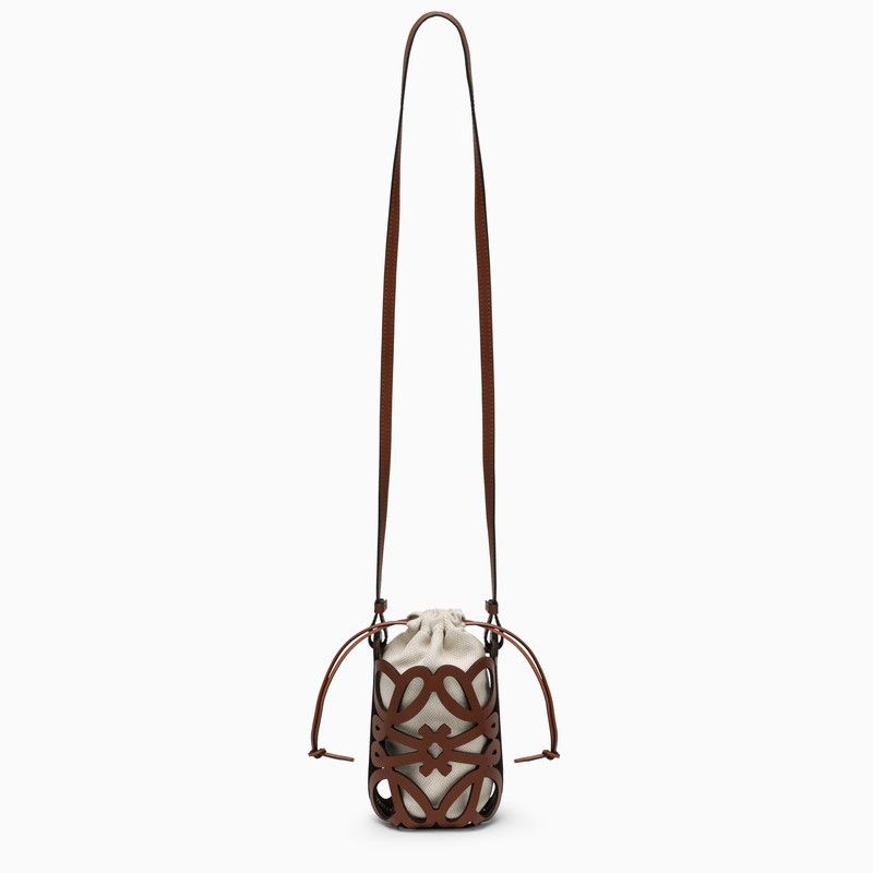 image of Loewe Anagram Cut-Out Bucket In Brown Leather in Orange, Women's