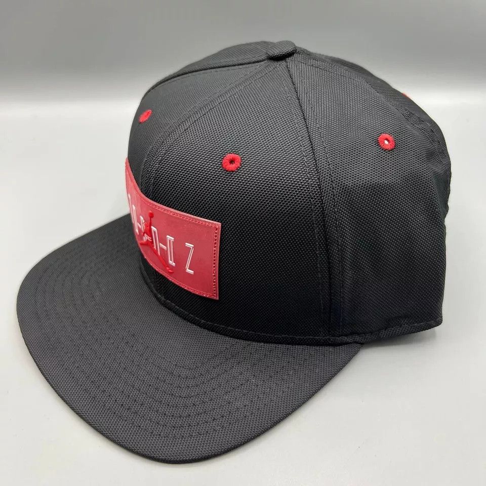 Jordan Brand Air Jordan 11 Hat Men Black Red Jumpman Bred Snap Back Cap Size ONE SIZE - 2 Thumbnail
