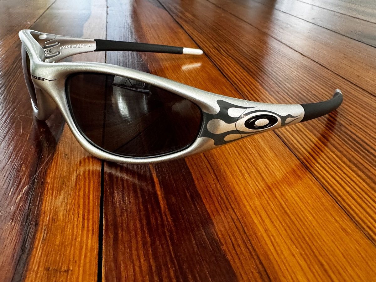 Oakley MUZM Straight Jacket 99 silver flames OAKLEY MUZM Straight