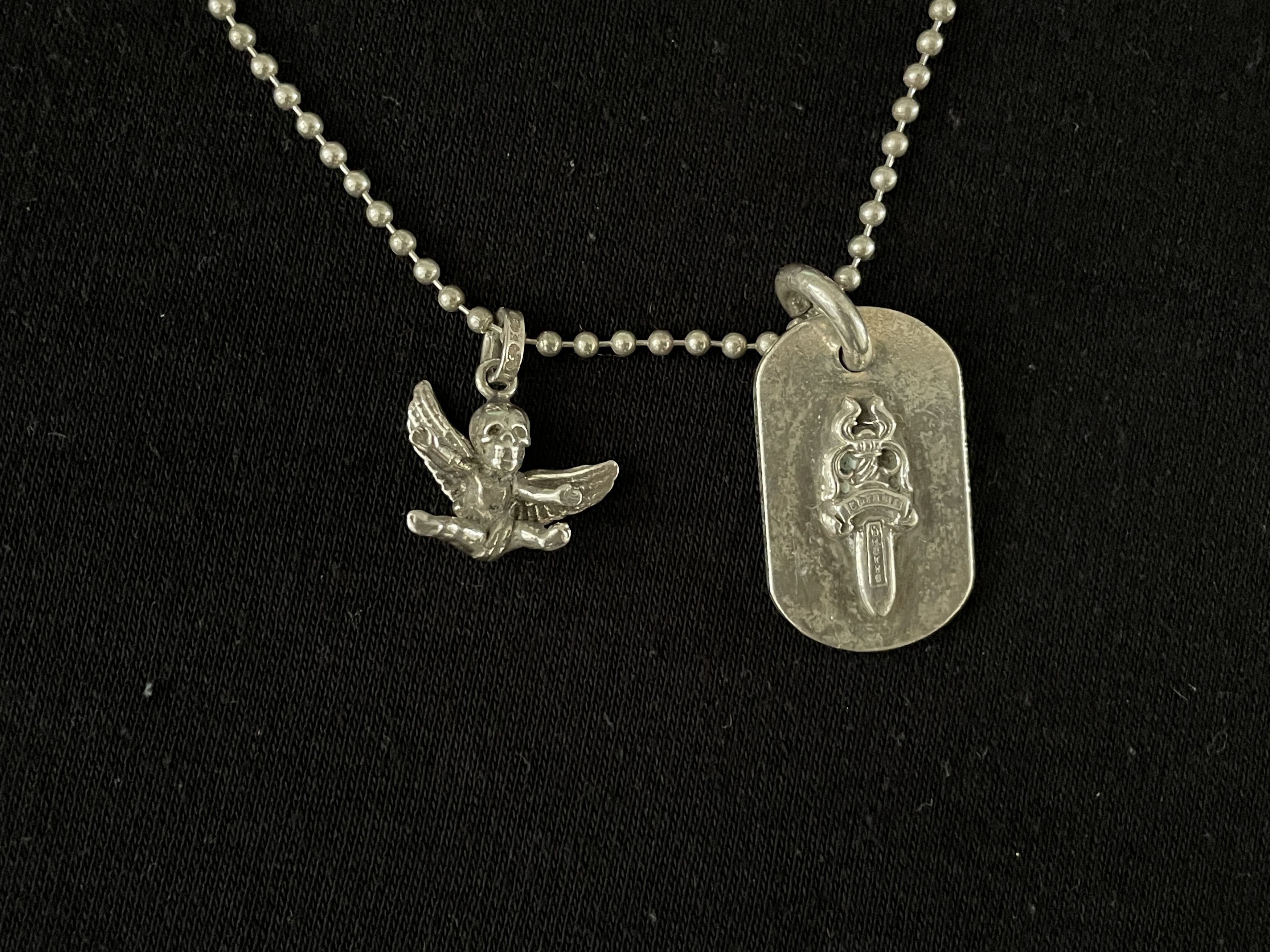 image of Chrome Hearts Foti Miss Lerlene + Raised Dagger Dog Tag in Silver, Men's