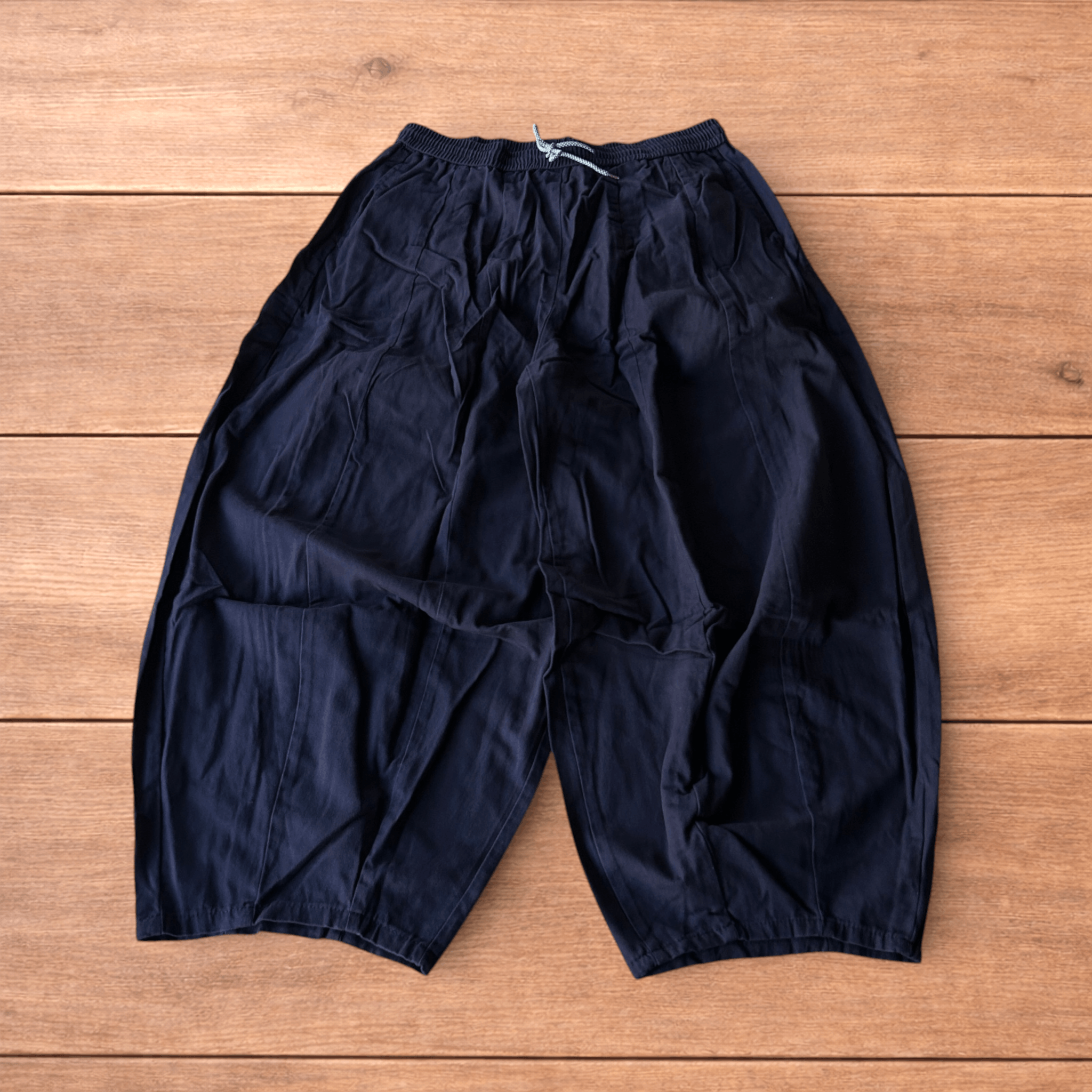 Super baggy wide leg parachute trousers in navy blue.