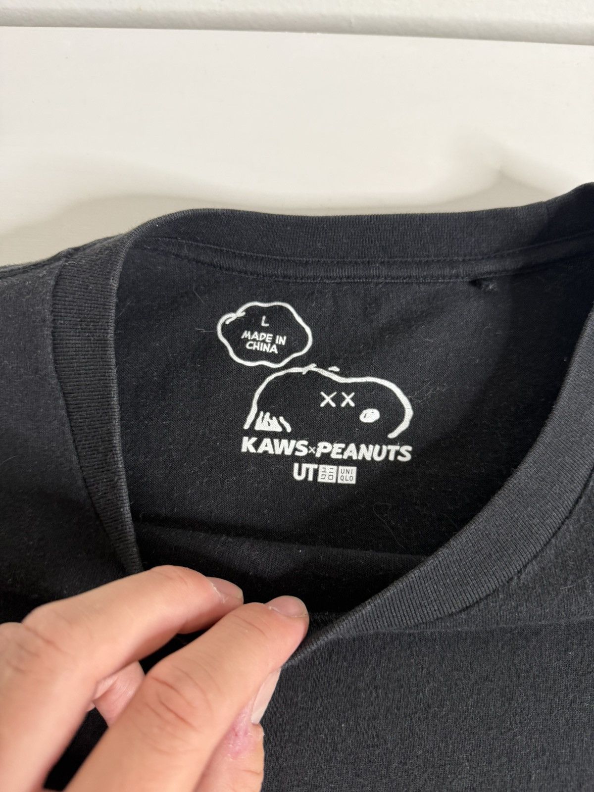 Kaws × Peanuts × Uniqlo KAWS x Peanuts Pocket Tee "Black" (L) *PREOWNED* Size US L / EU 52-54 / 3 - 5 Thumbnail