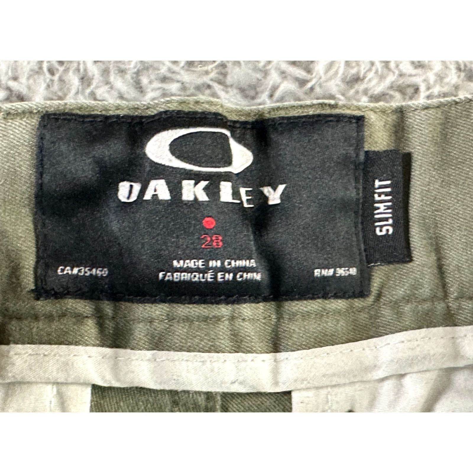Oakley Oakley Pants Mens Olive Green Stretch Tapered Elastic Cuffs Size 28 Front Flat Front Zipper Logo Belt Loops 60/36/4 Elastane Casual Pants Size US 28 / EU 44 - 6 Thumbnail