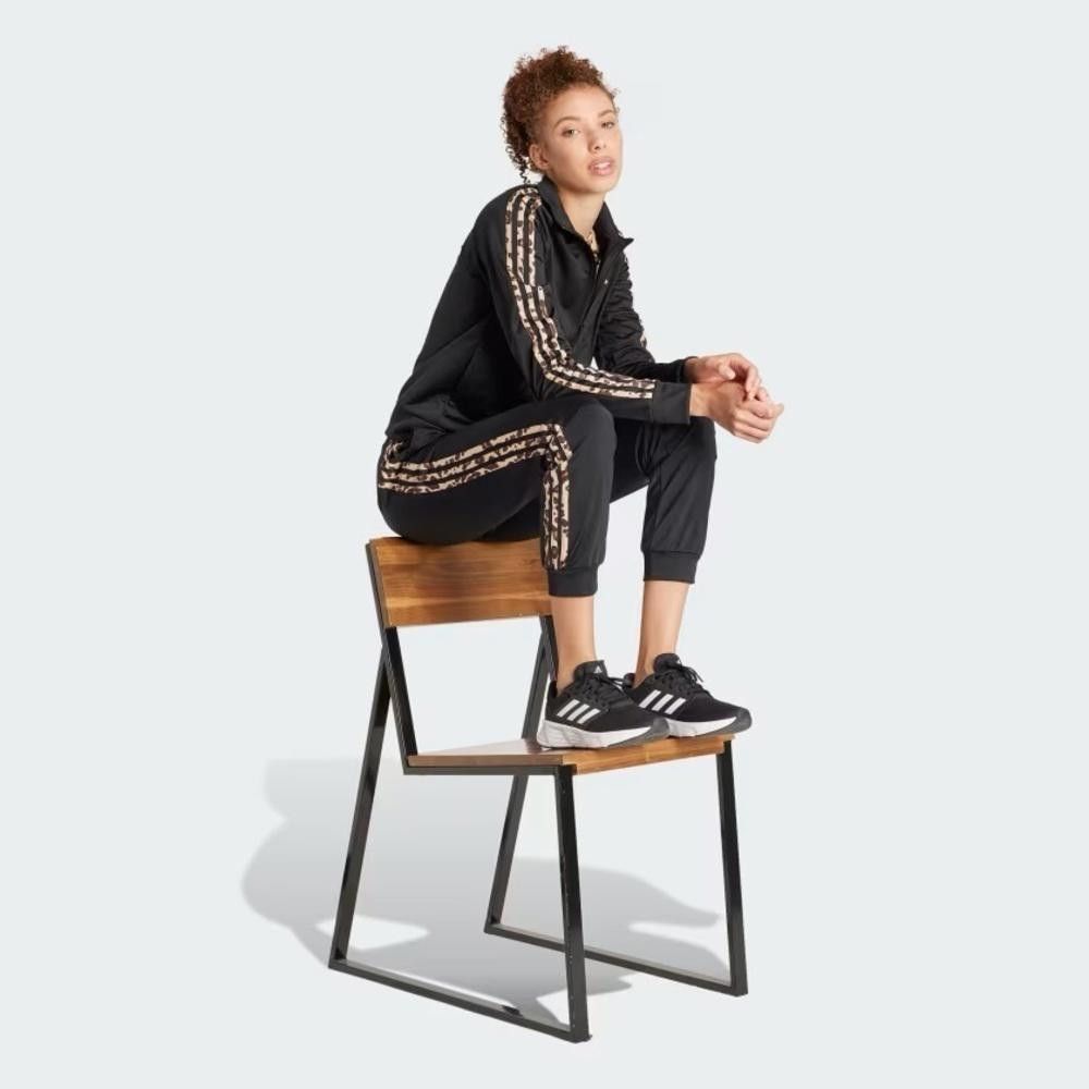 Adidas Adidas ESSENTIALS ANIMAL PRINT TRACK PANTS used Size 26" / US 2 / IT 38 - 6 Thumbnail