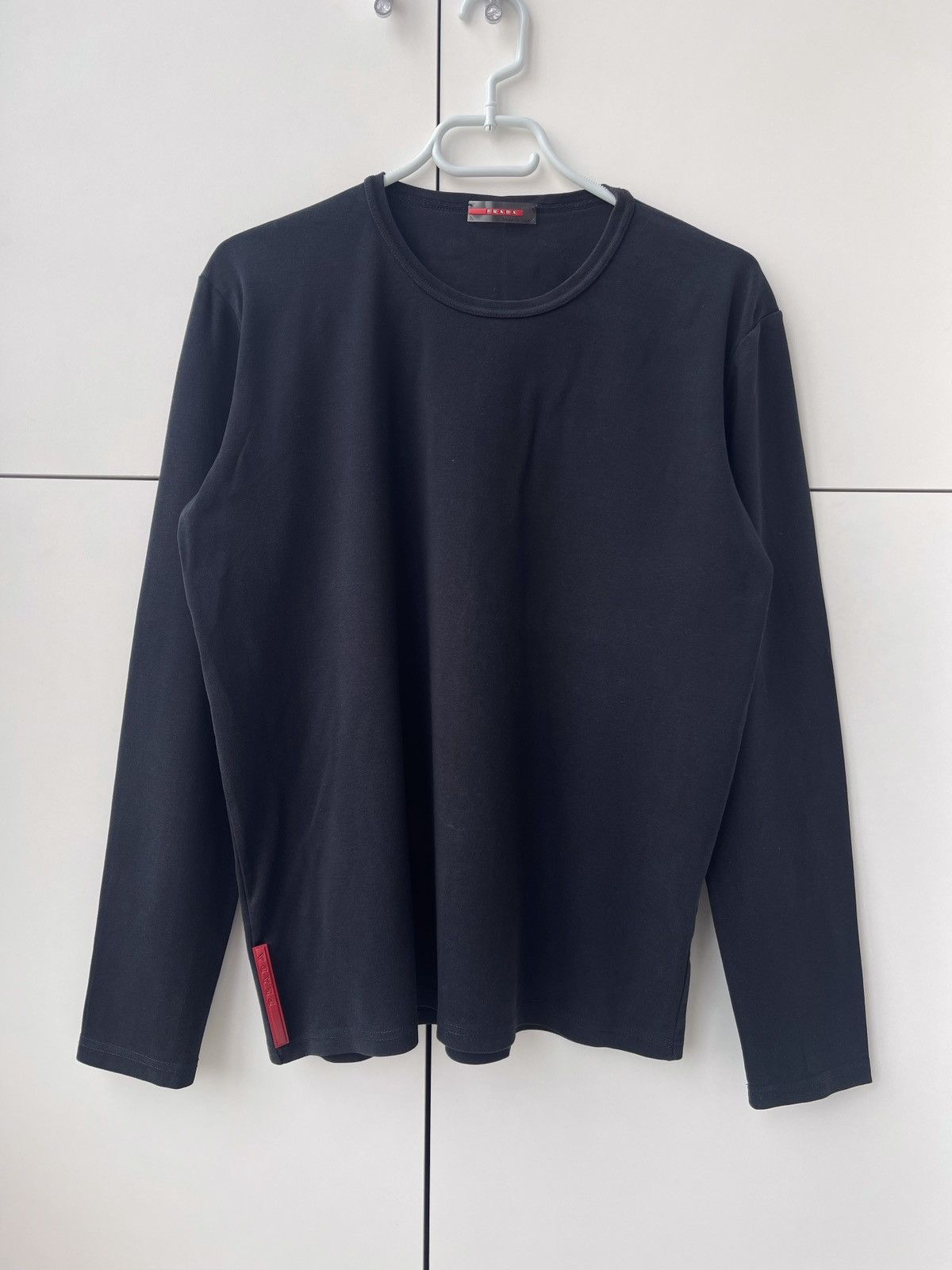 Logo oversized cotton T-shirt in grey - Prada | Mytheresa