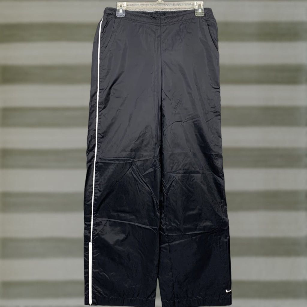 Nike Nike Running Pants Women’s Size 4/6 Black 2 Slash Pockets 8” Zipper at Ankle Size 27" / US 4 / IT 40 - 1 Thumbnail