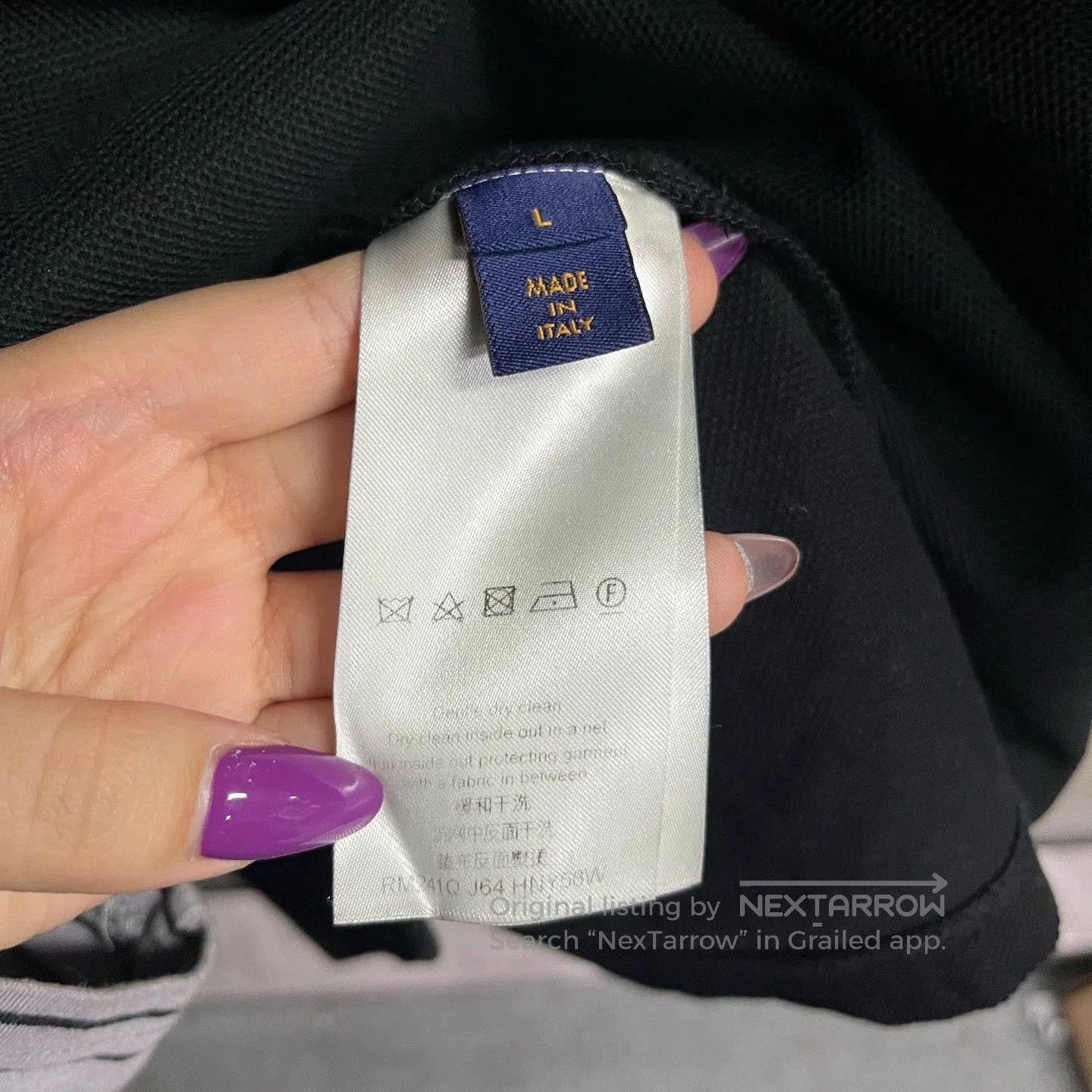 black louis vuitton embroidered logo polo shirt.