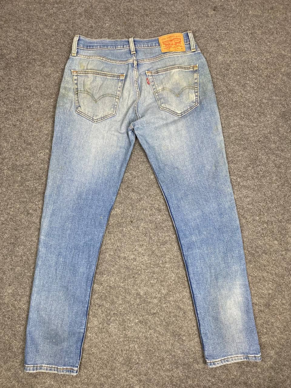 image of 511 Slim Distressed Denim in Light Blue, Men's (Size 32)