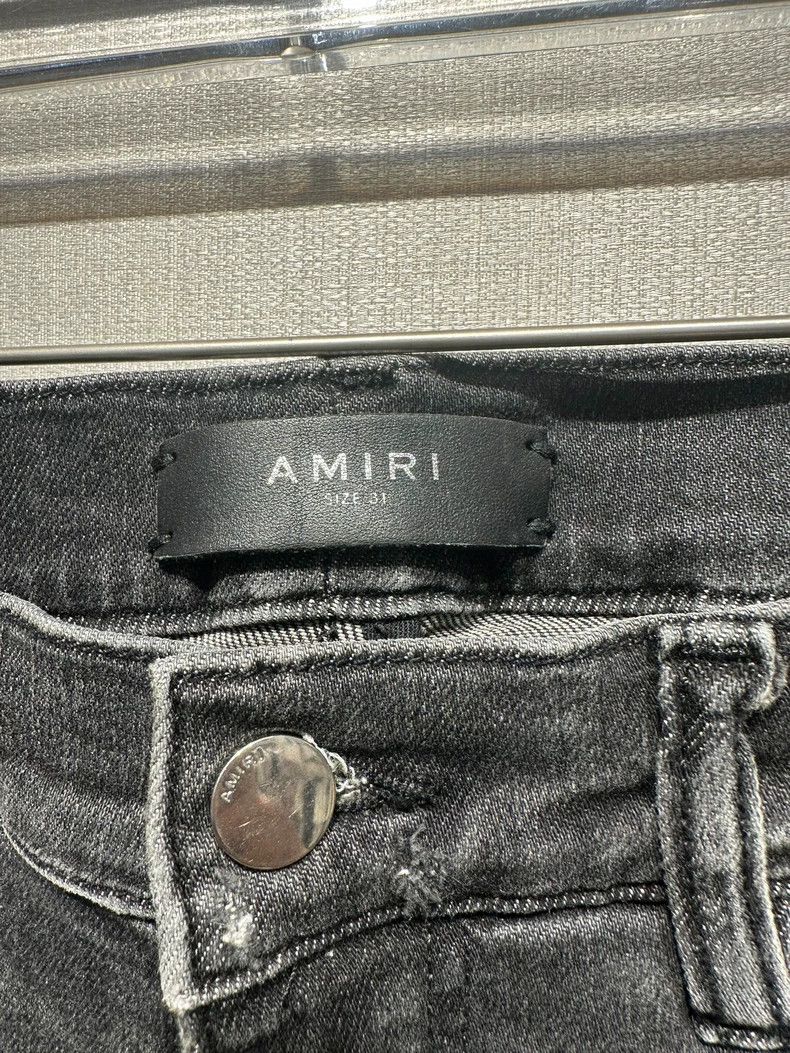 Amiri grey double knee hole spotted jeans