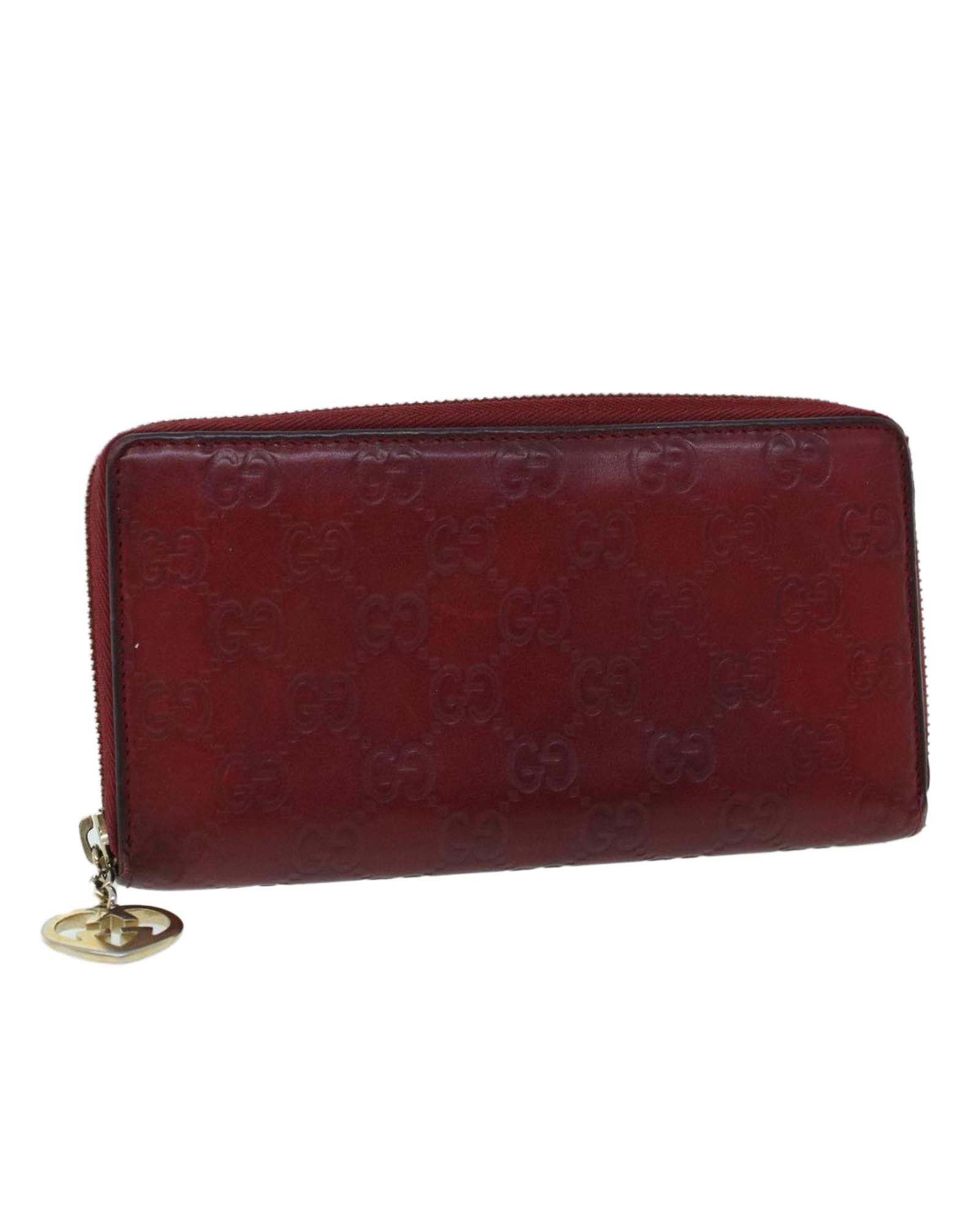 image of Canvas Long Wallet With Guccissima Pattern in Wine Red, Women's