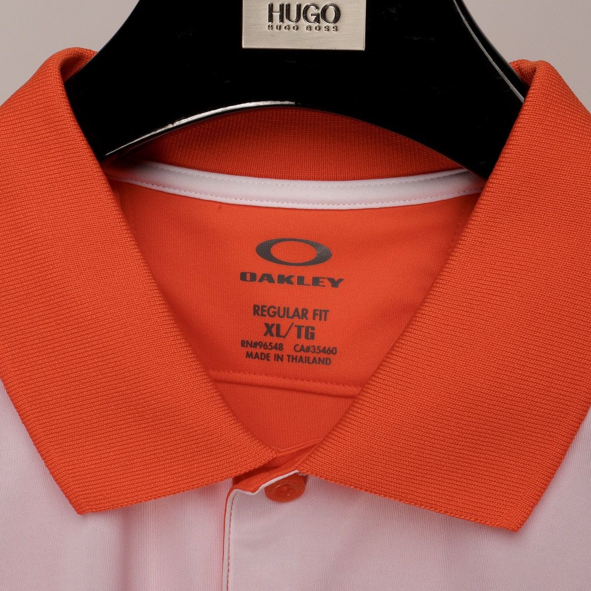 Oakley NEW Men’s Oakley Slide Polo Shirts Red Orange Size: XL Size US XL / EU 56 / 4 - 7 Thumbnail